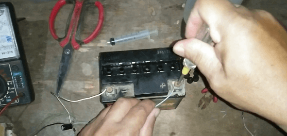 Revive a dead motorcycle battery
